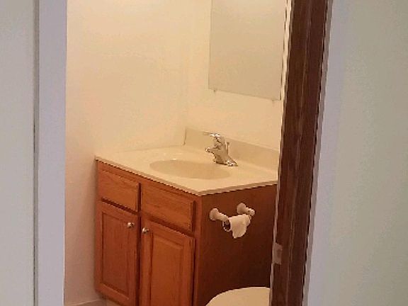 Bathroom also has a shower.