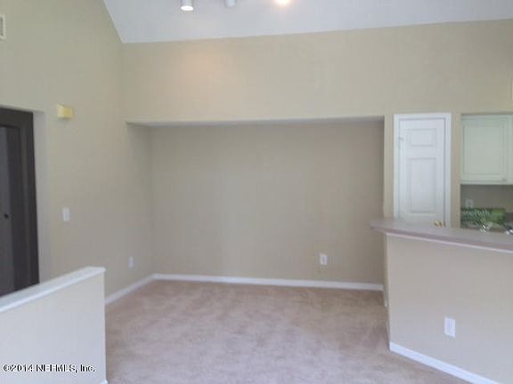 2nd image of 13700 Richmond Park Dr N APT 407
