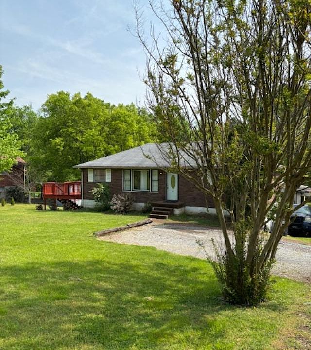 exterior of house, apartment is in basement