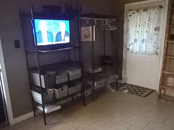 Main room. 32" TV w/ROKU. Plenty of storage.