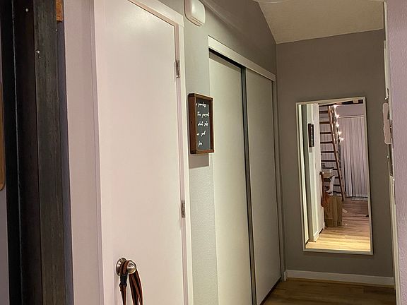 Hall to bathroom. Lots of storage space.