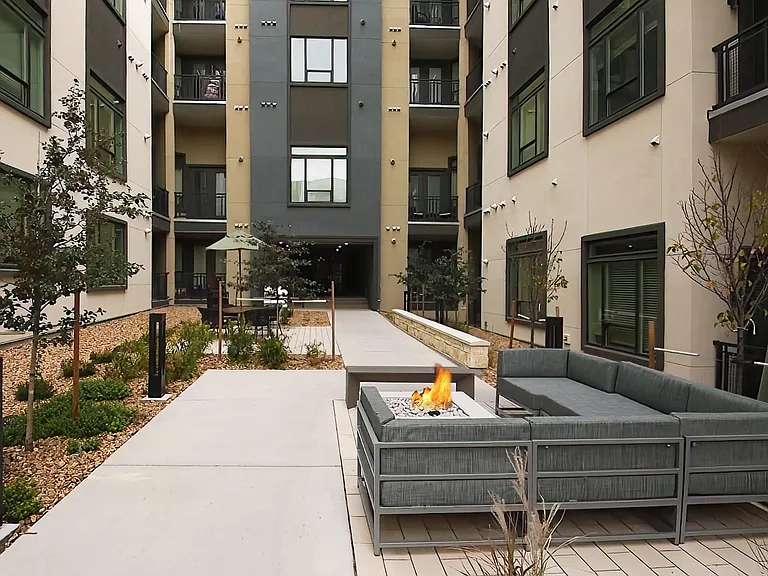 Modern Outdoor Courtyard with Firepit Lounge Area
