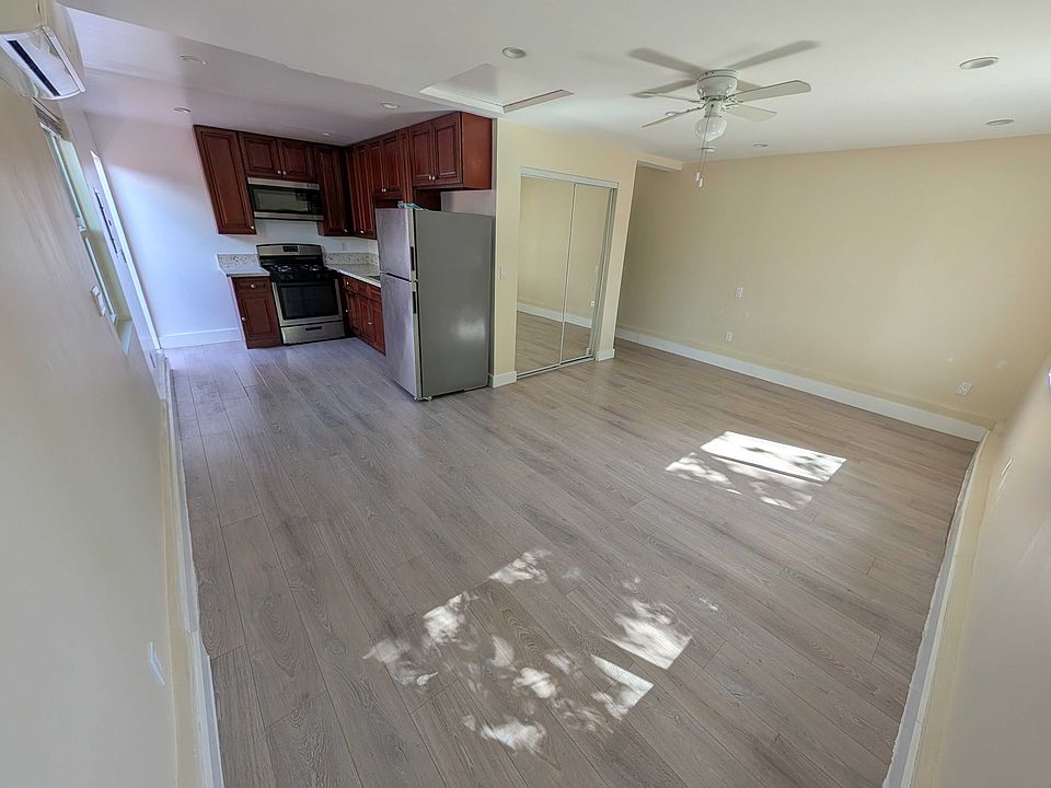 Open layout with kitchen and living area
