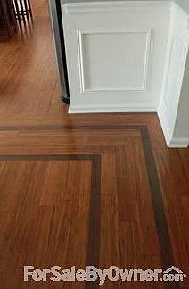 Wood floor Inlay that outlines Dining Rm