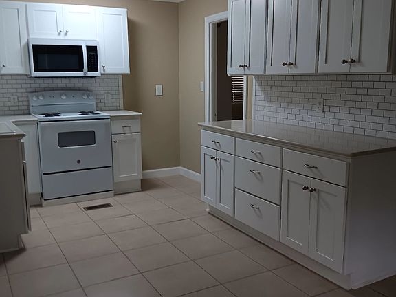 Kitchen area with lots of counter space and cabinets!