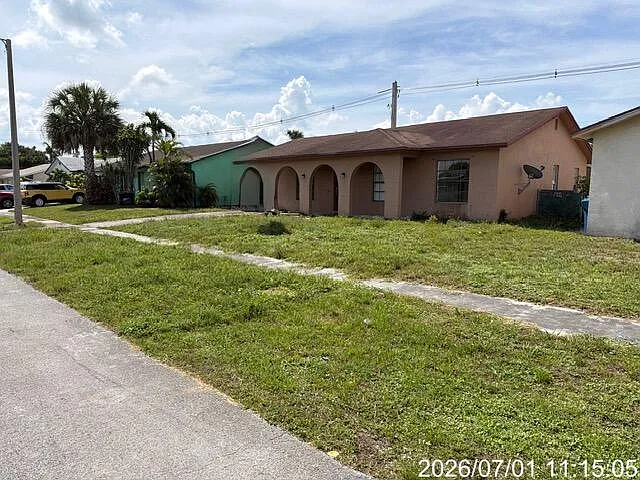 11044 NW 23rd Ct — Photo 1