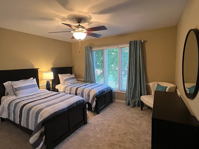 3rd bedroom- 2 twin beds, dresser, 2 closets
