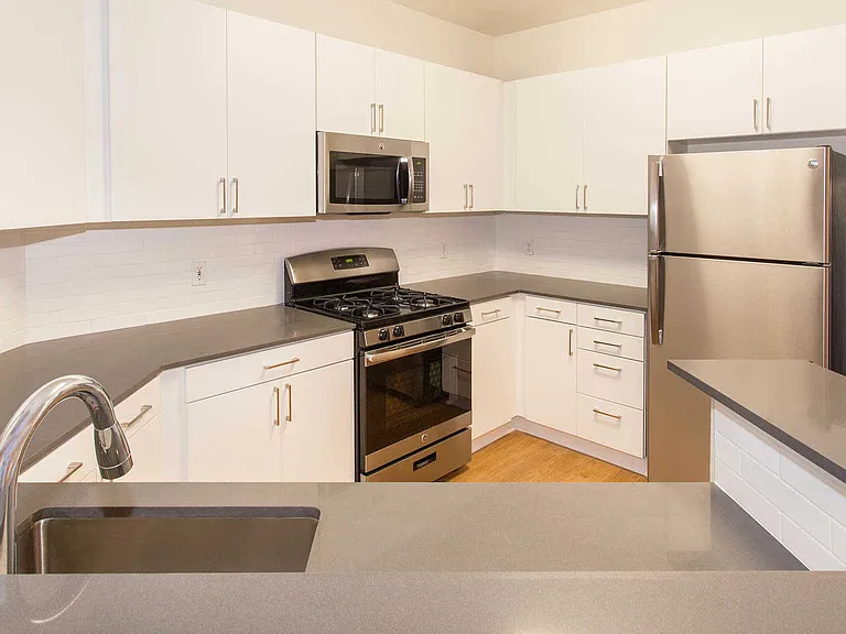 Phase 1 Kitchen with Stainless Steel Appliances and Granite Countertops