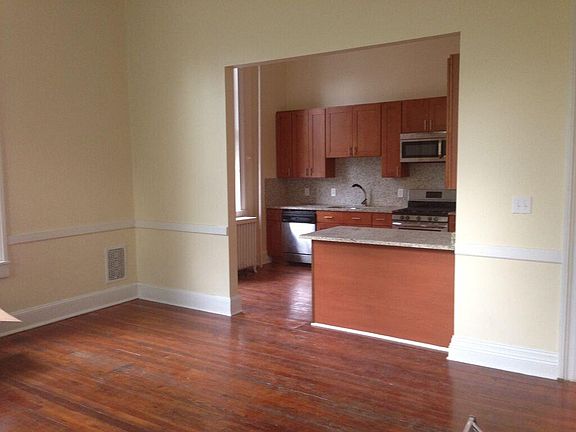 Breakfast bar and kitchen from living room