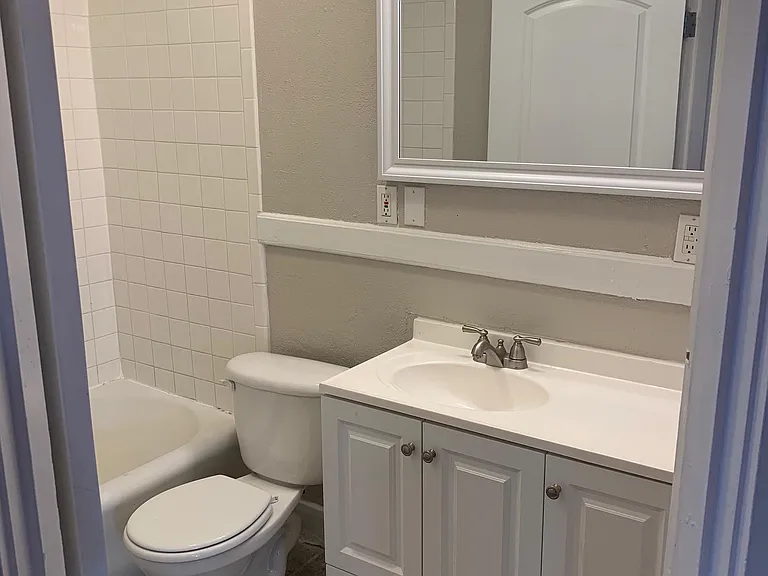 Clean, updated bathrooms with plenty of storage.