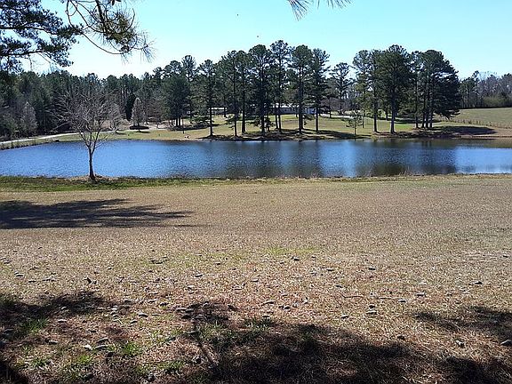 5 Ac. +/-  Stocked Pond 