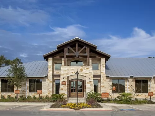 Exterior of Clubhouse and Leasing Office - Platinum Shavano Oaks Apartments