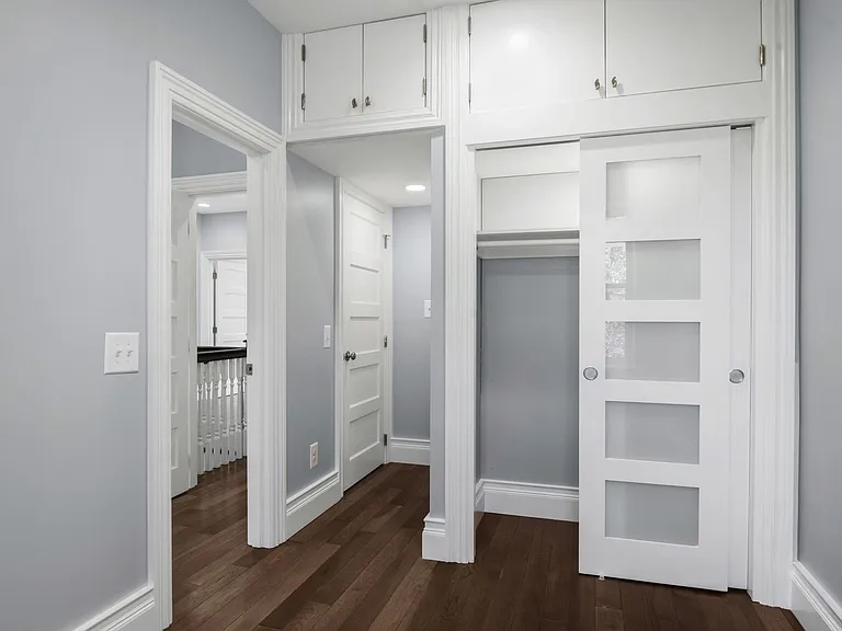 3rd bedroom with 2 enclosed storage spaces above closet door. private entrance to this bedroom + access to master bedroom