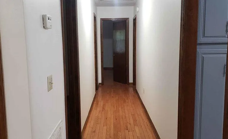 Hallway leading to bathroom and bedrooms