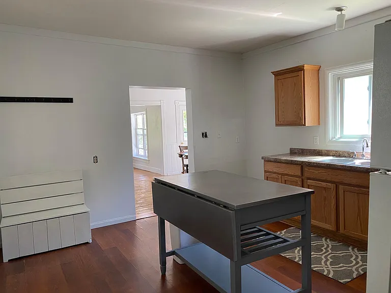 Kitchen with island looking into the Dining Room