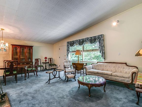 Vaulted ceiling lends an airy feel to open space