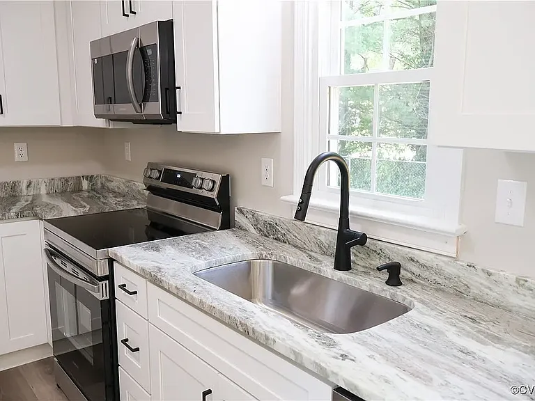 Kitchen with granite countertops