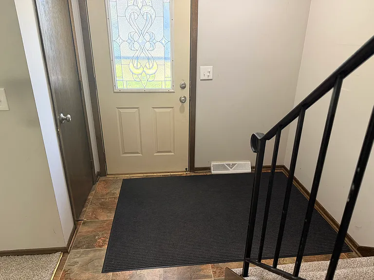 Entryway with coat closet