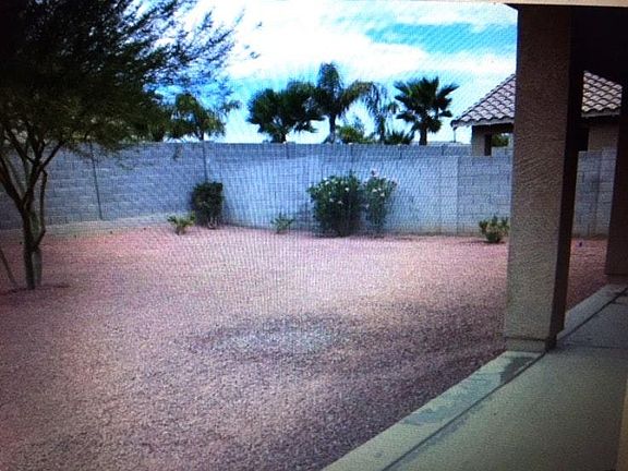 good size back yard with covered patio