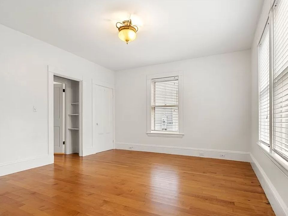 Sunny first bedroom located in the front of the apartment.