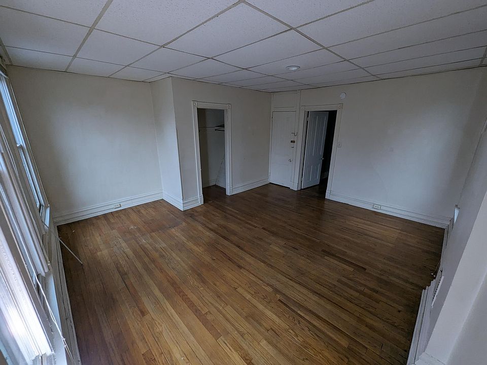 Bedroom is street facing with 4 windows and 1 closet