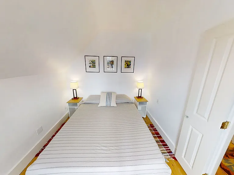 Second level bedroom 2 with queen size bed