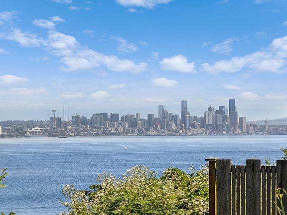 Views to the south include miles of shipping lanes and  Seattle skyline.