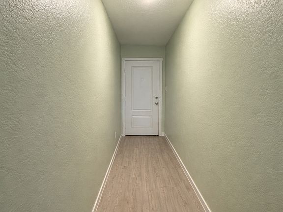 Front door and entry hallway