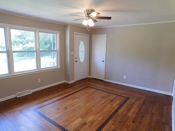 Formal Living Room featuring a Unique Hardwood Floor pattern that includes Maple, Walnut and Oak.