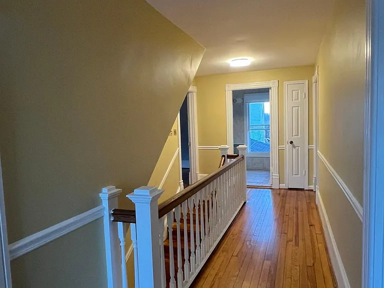 2nd Floor Hallway Showing Shared Full Bathroom