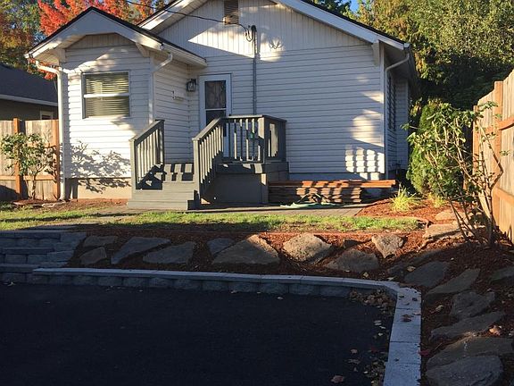 two enclosed parking spots in rear