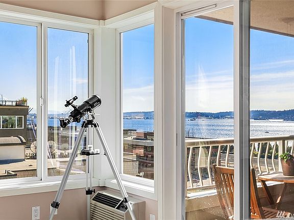 Stunning views from this top floor penthouse condo with no shared walls! Enjoy the sunrise and sunset from your private balcony.