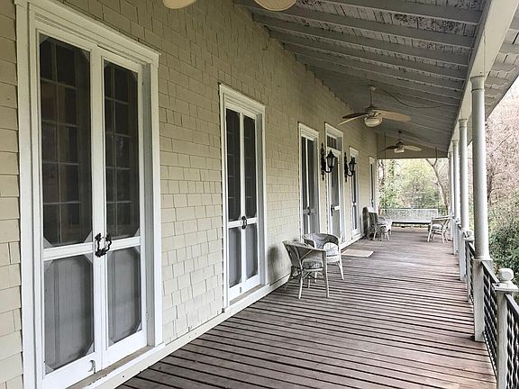 View of front porch, showing French doors and swing