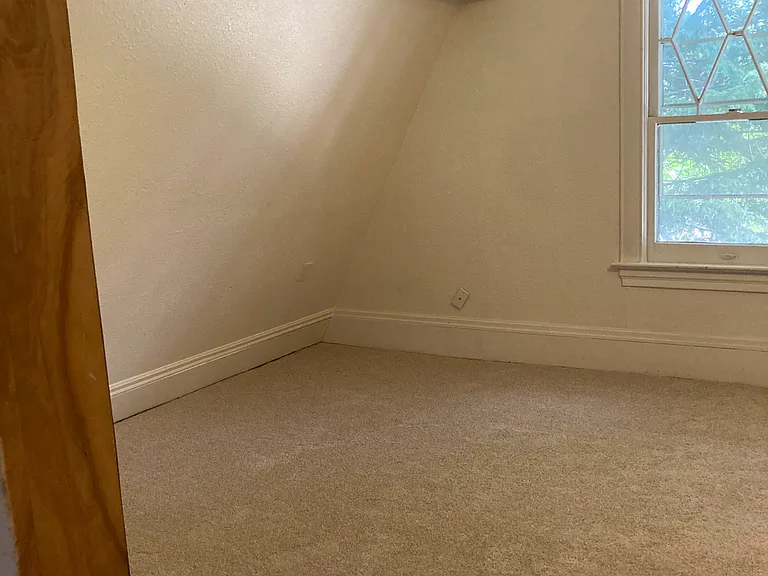 BIG 2nd floor bedroom, left