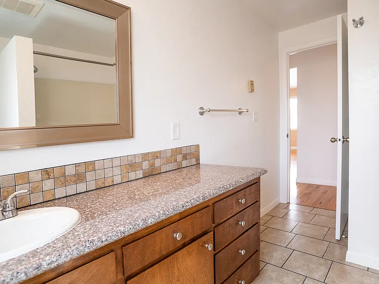 granite countertops and tile in bathrooms
