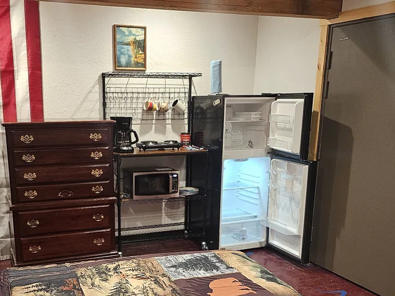 Dinette, with full kitchen and TV in the Camper.