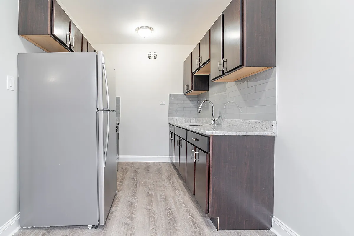 Building Photo - 6206 N Bell Ave #104