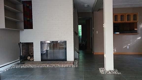fireplace + living rm + dining rm