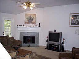 Large family room features fireplace.