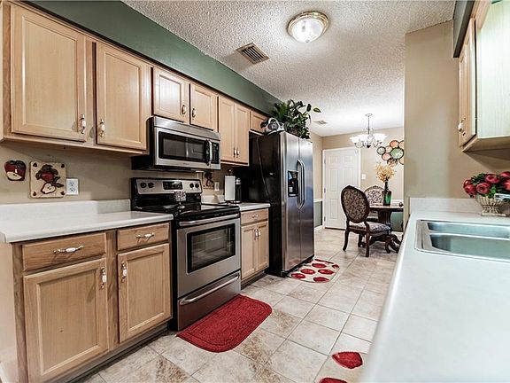4th image of 6242 Woodside Dr N