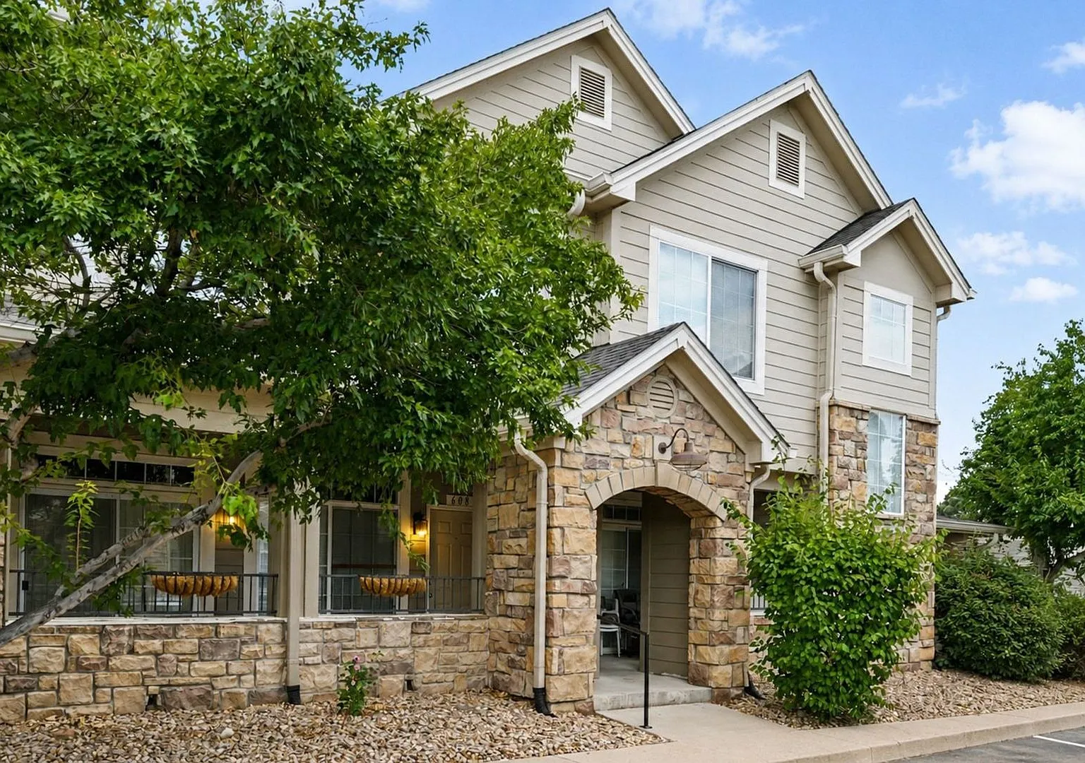 Spacious 2BR/2BA Aurora Condo | Garage, Community Pool & In-Unit Laundry — Photo 1
