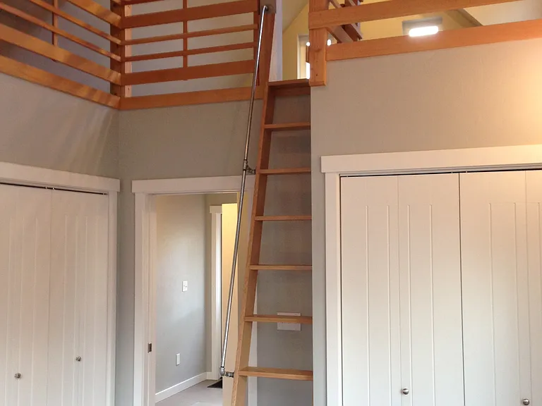 View of loft in primary bedroom