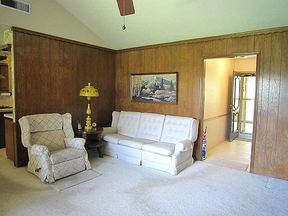 Entry connects to large open living space.