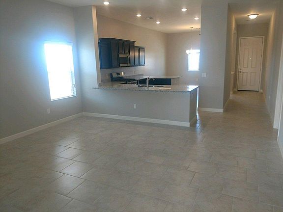 This is the family room looking in at the connected kitchen