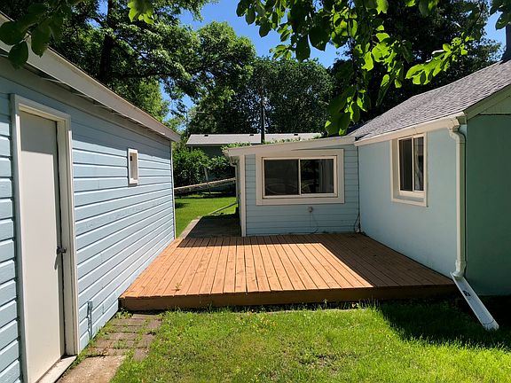 Sunroom to garage decking