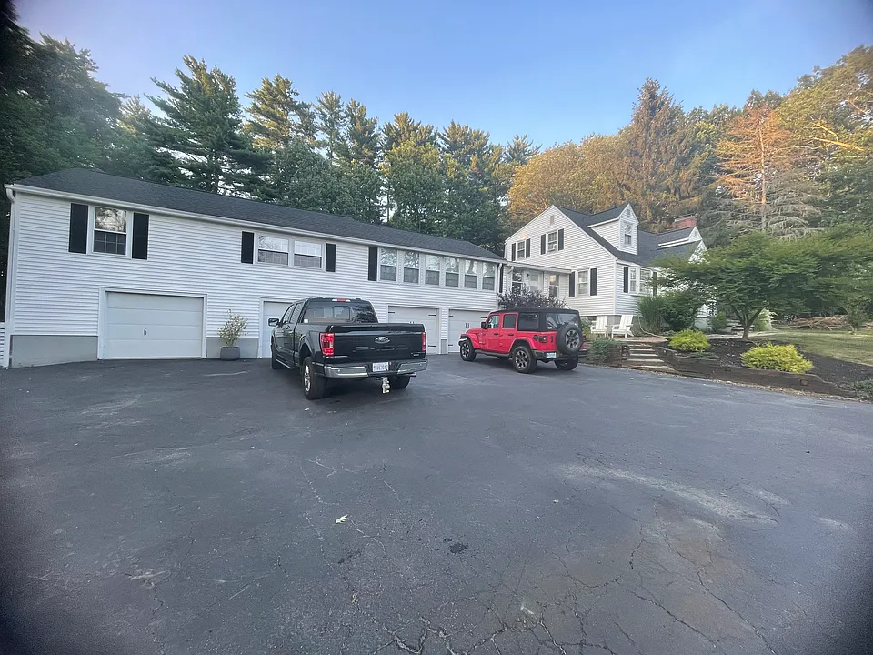 View of front of house far left garage designated to tenant