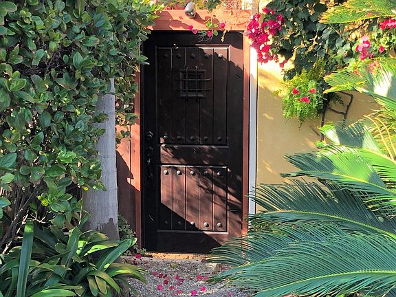 Entry gate to private garden entrance to Guest House