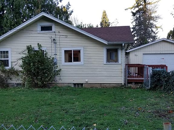 Side w driveway and garage