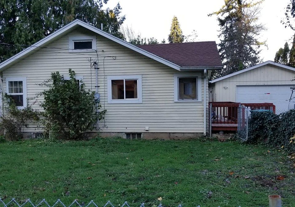 Side w driveway and garage