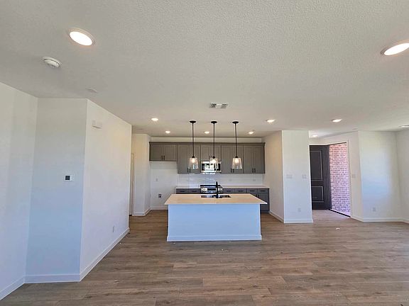 Open Kitchen-Dining Room Construction Progress featuring the Minimalist Collection